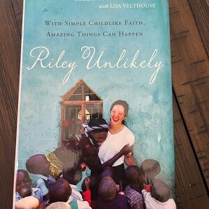 Riley Unlikely Hardback Book